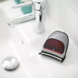 Remington Quick Cut Cordless Hair Clipper + 9 Guide Combs (HC4250) - Image 1